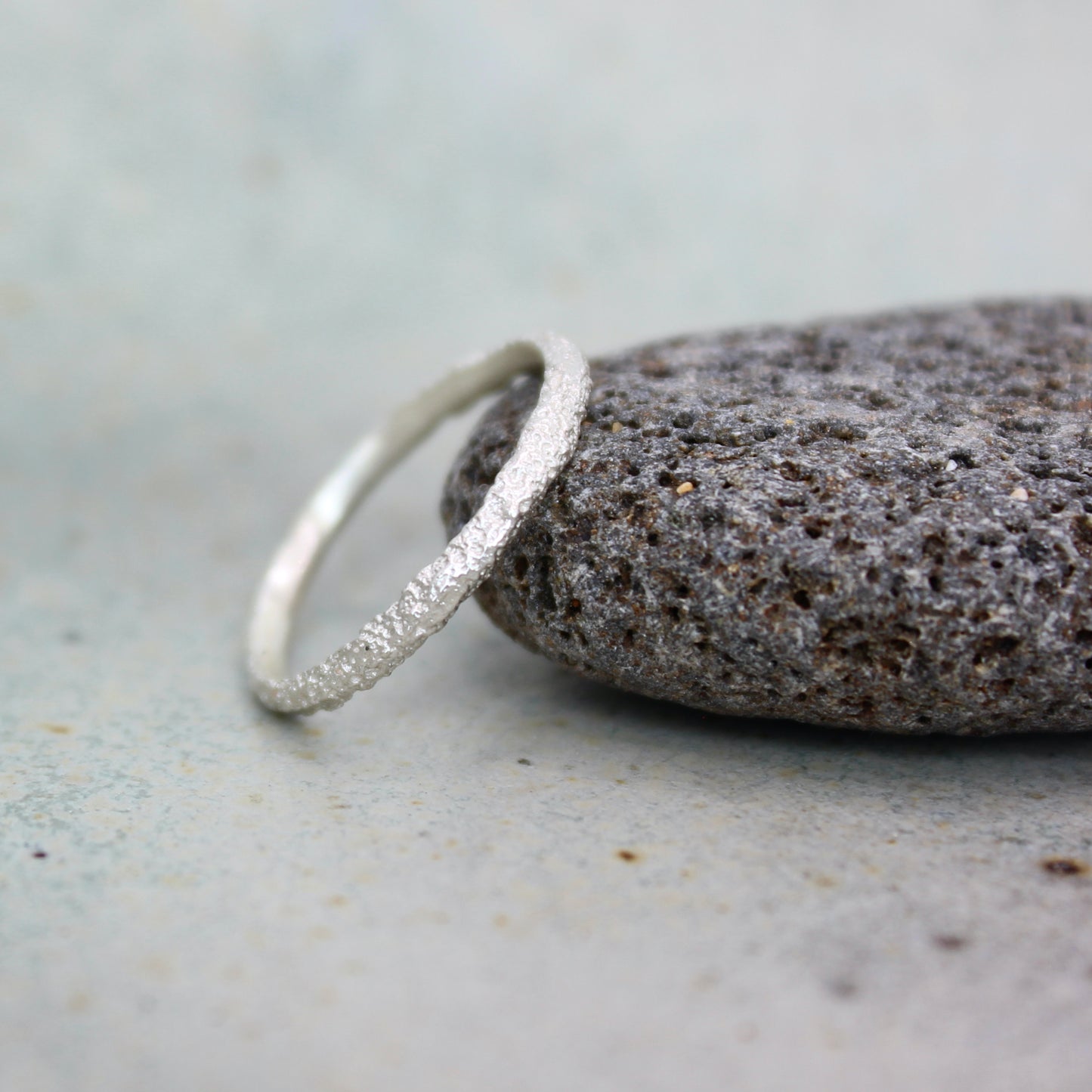 Tiny Mbégté ring | sand texture