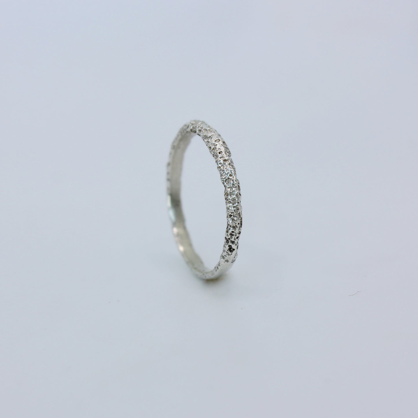 Tiny Mbégté ring | sand texture