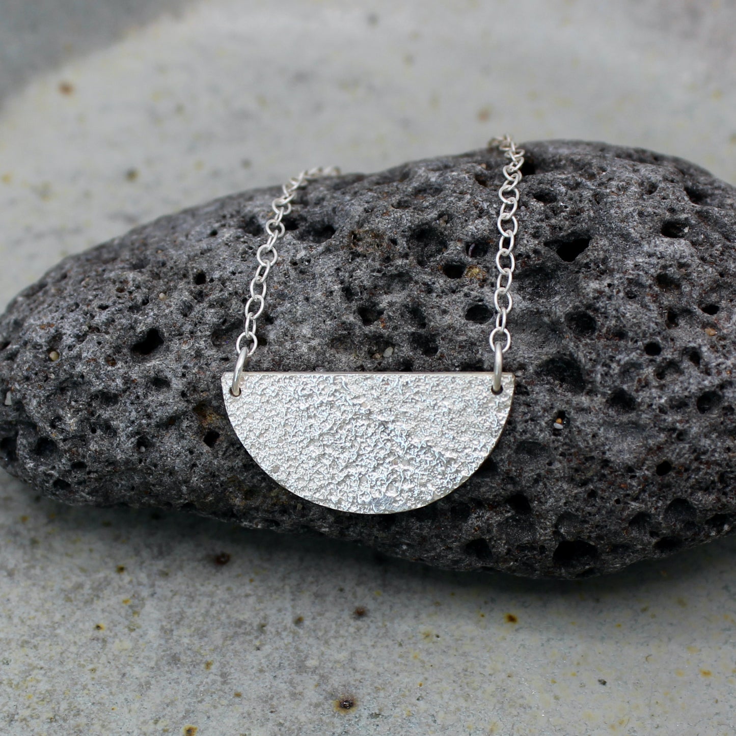 Half Moon Necklace | sand texture